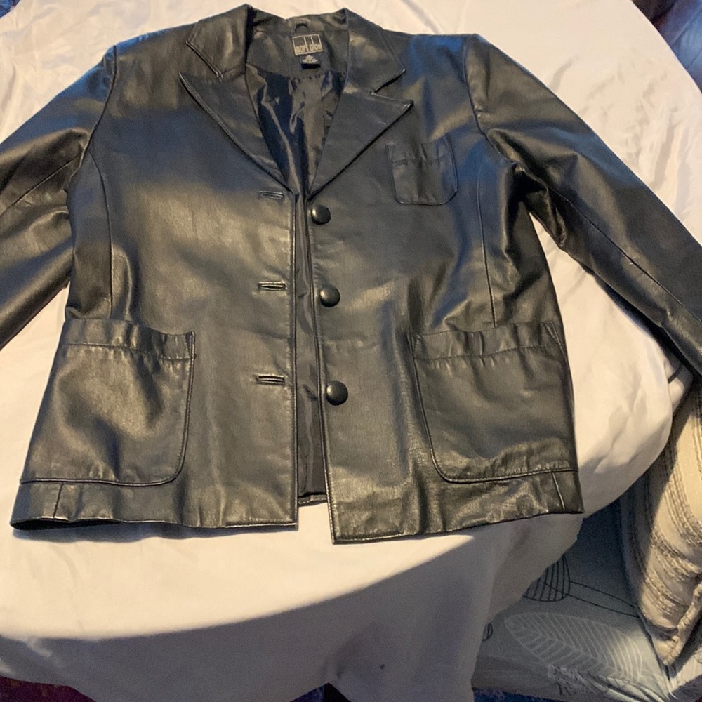 Woman’s size 16 black leather blazer.